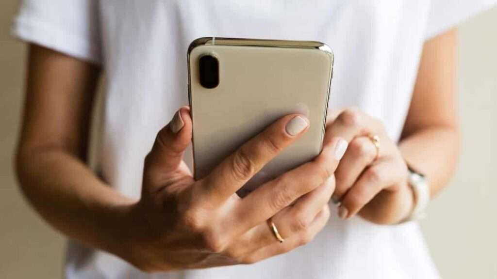 Woman holding mobile phone